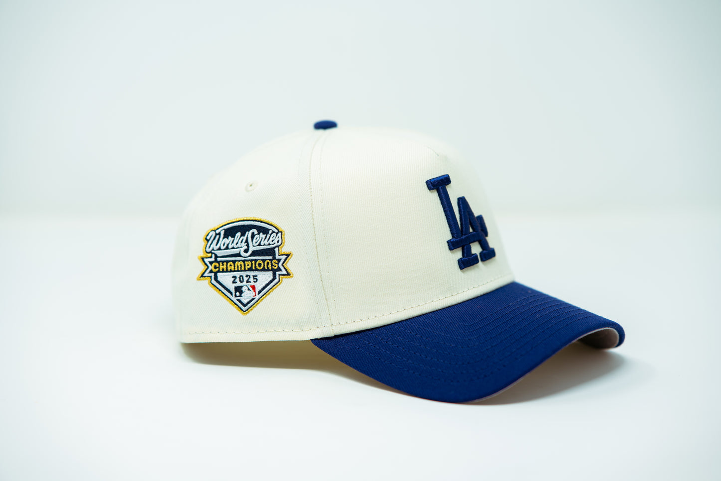 New Era LA Dodgers 2025 World Champions 940 A-Frame Snapback White/Royal Blue